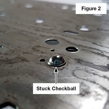 Checkball Stuck in Plate